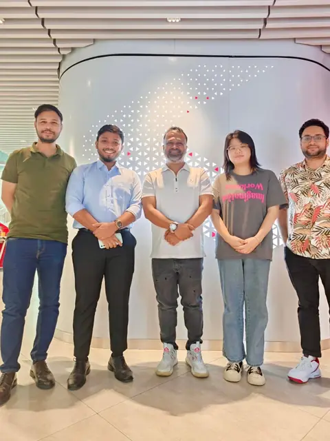Team photo at a client meeting